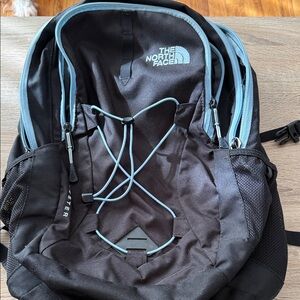The North Face Black and Light Blue Backpack